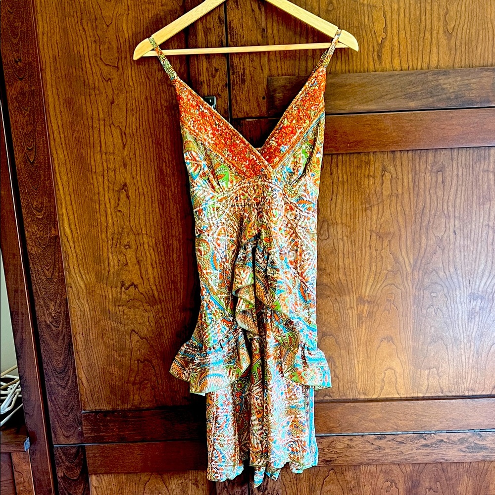 Vibrant Sleeveless Dress with Ruffle Hem